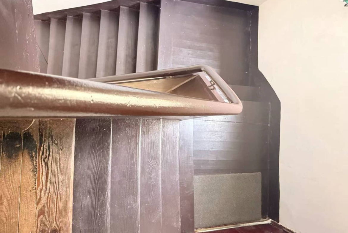 2-bed, 1-bath unit at Aitang Xincun on YUqing Road. 100 sqm, private terrace, heritage building, owner direct. Near Shanghai Library Station. 18,000 RMB/month.
