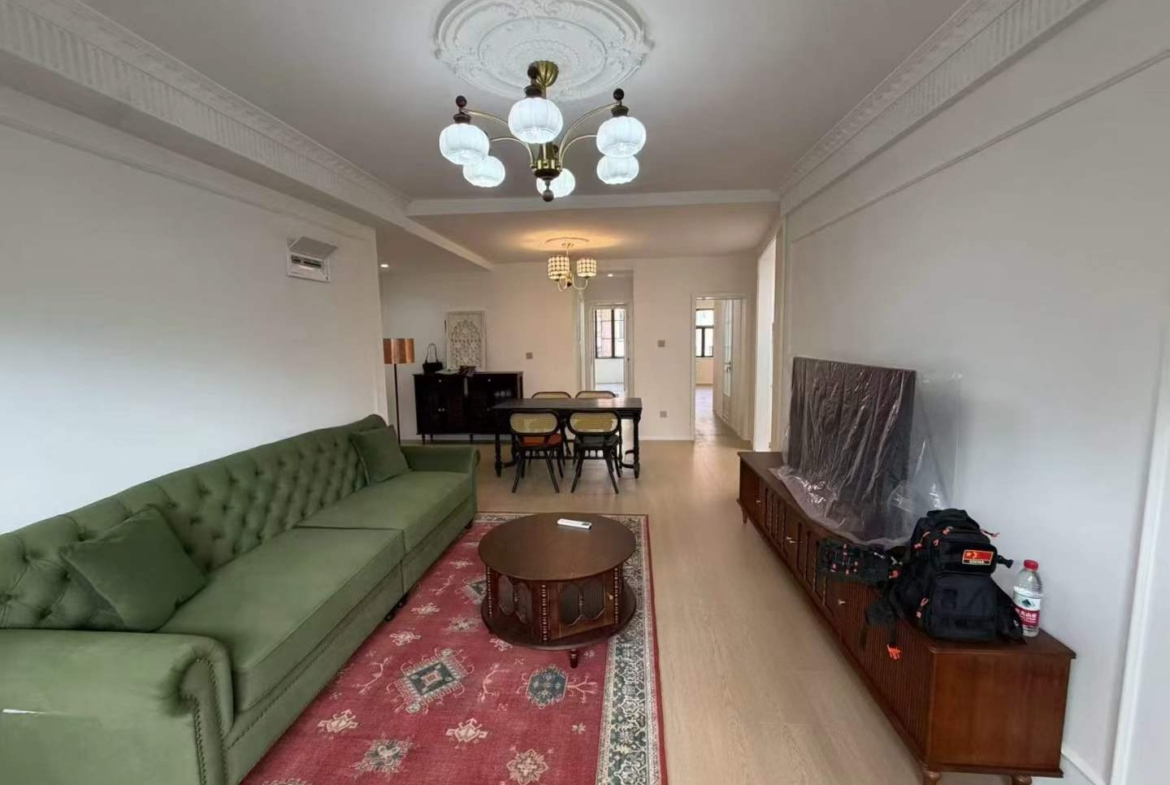 2+1 bed, 2-bath unit at Lianhua Apartment on Beijing West Road. 120 sqm, new French renovation, large balcony. 22,500 RMB/month.