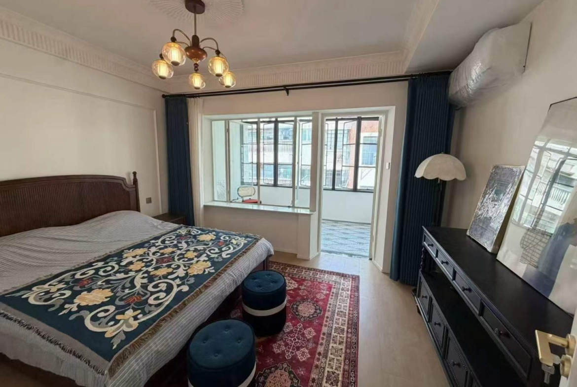 2+1 bed, 2-bath unit at Lianhua Apartment on Beijing West Road. 120 sqm, new French renovation, large balcony. 22,500 RMB/month.