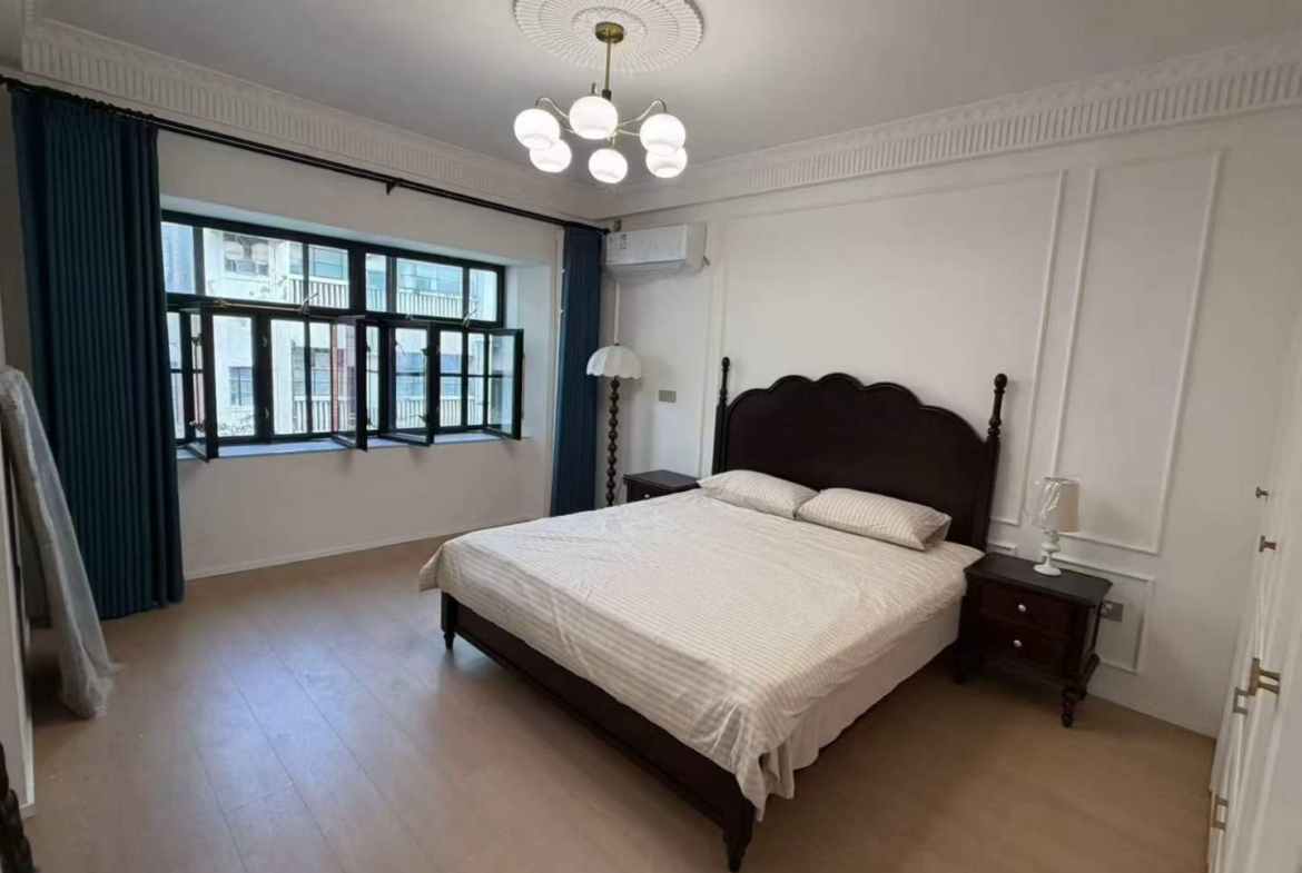 2+1 bed, 2-bath unit at Lianhua Apartment on Beijing West Road. 120 sqm, new French renovation, large balcony. 22,500 RMB/month.
