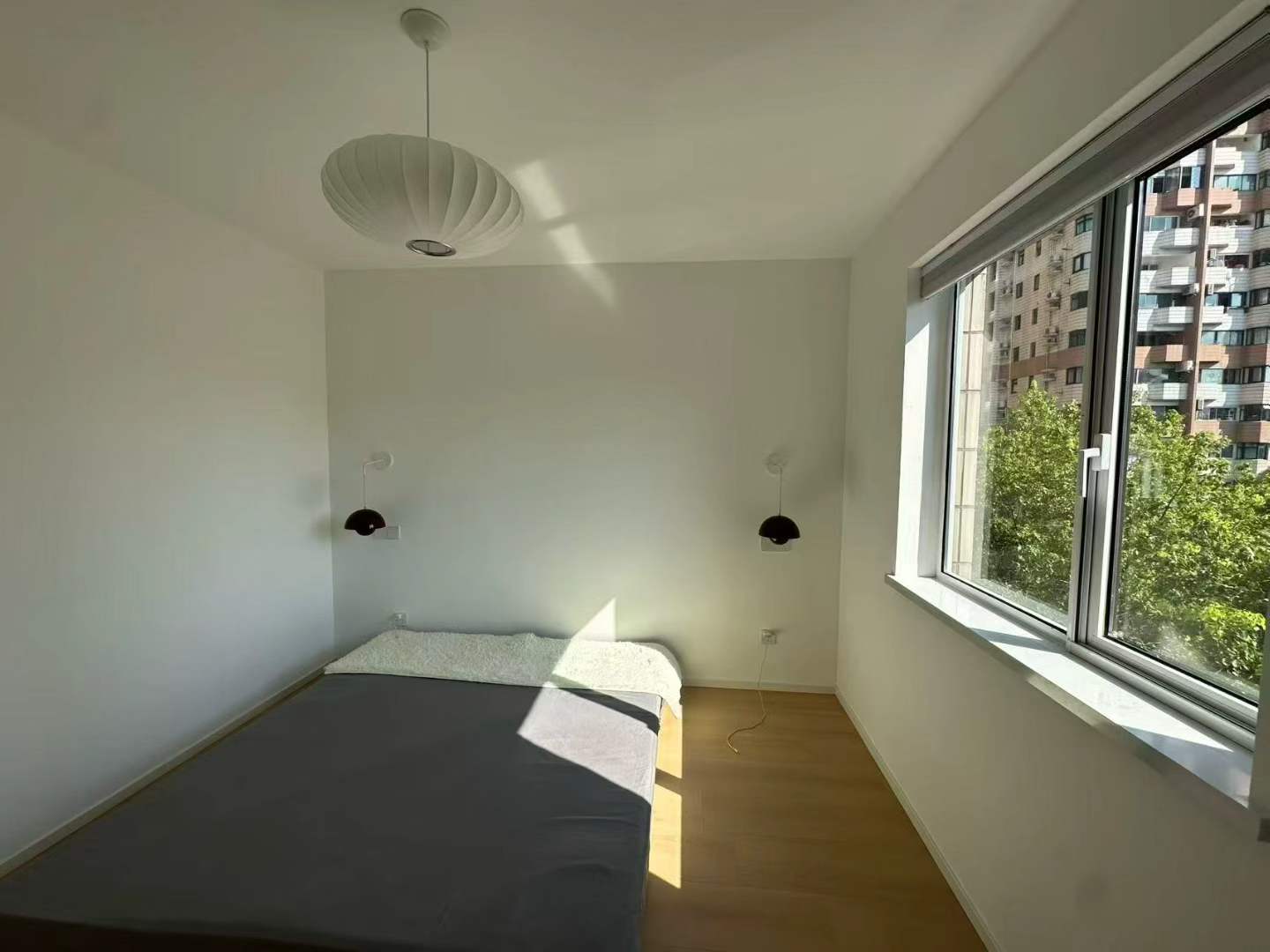 2-bed, 2-bath unit at Shanghai Grand Plaza on Julu Road. Fully furnished, bright unit, clubhouse with pool and gym. 18,000 RMB/month.