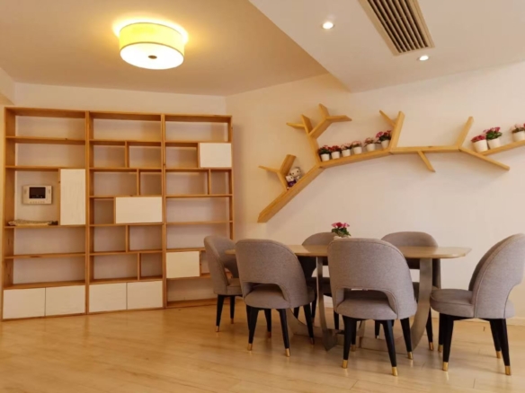 2-bed, 2-living, 1-bath unit at Territory Shanghai. 118 sqm, south-facing balcony, central Jing'an location near Nanjing West Road. 19,000 RMB/month.