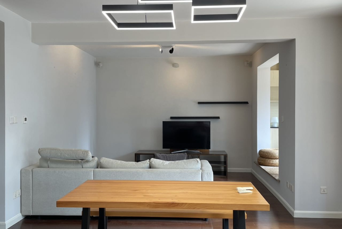 1+1 bedroom unit at Territory Shanghai with large terrace and open kitchen. 120 sqm, central Jing'an location, well-finished. Available July. 22,000 RMB/month.