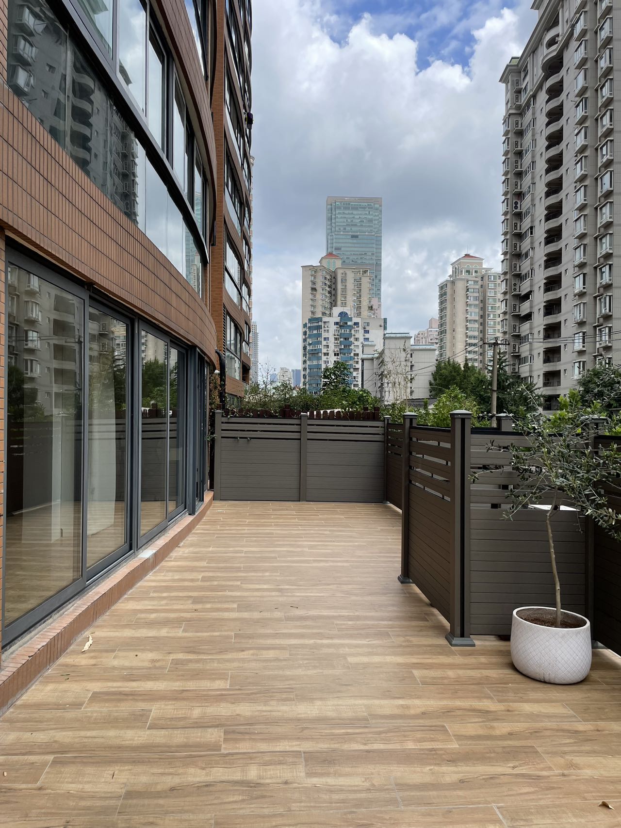 1+1 bedroom unit at Territory Shanghai with large terrace and open kitchen. 120 sqm, central Jing'an location, well-finished. Available July. 22,000 RMB/month.