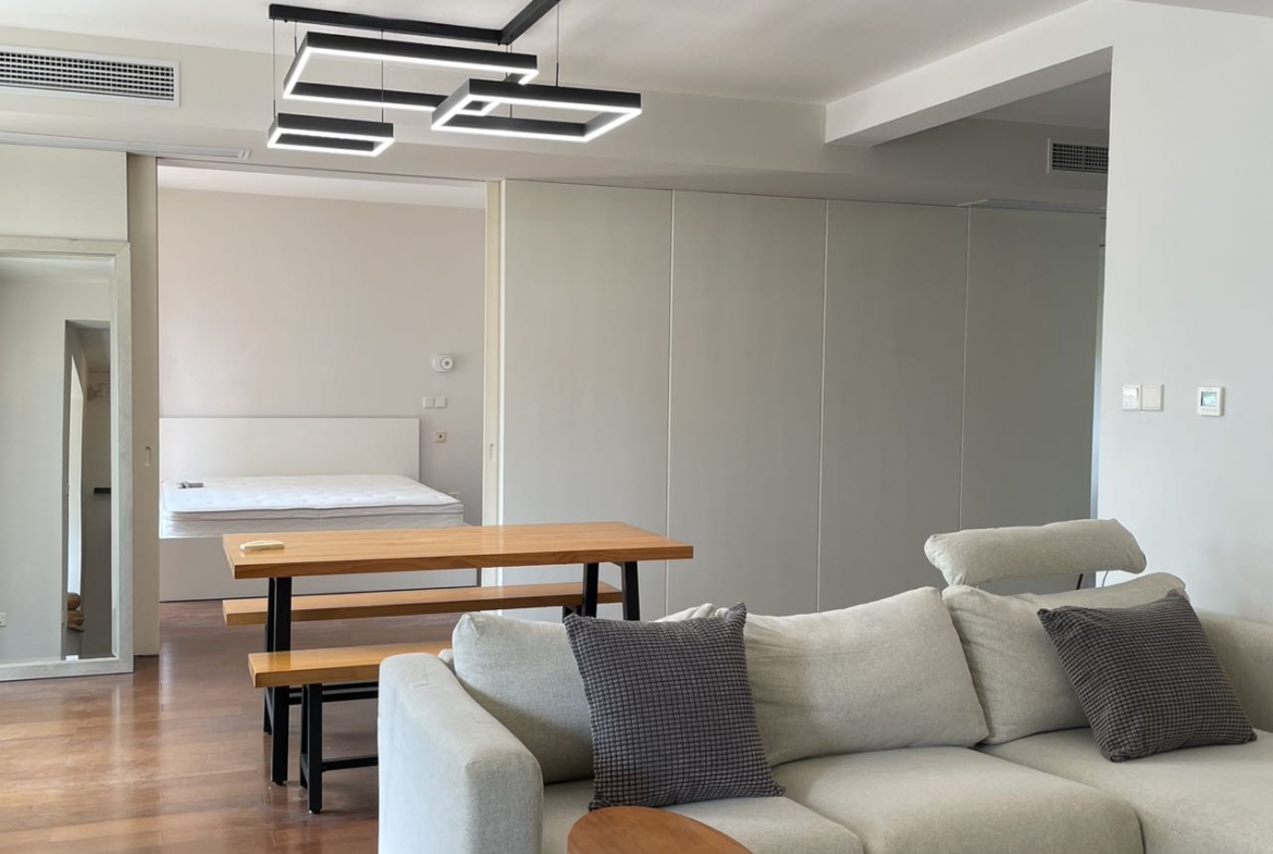1+1 bedroom unit at Territory Shanghai with large terrace and open kitchen. 120 sqm, central Jing'an location, well-finished. Available July. 22,000 RMB/month.