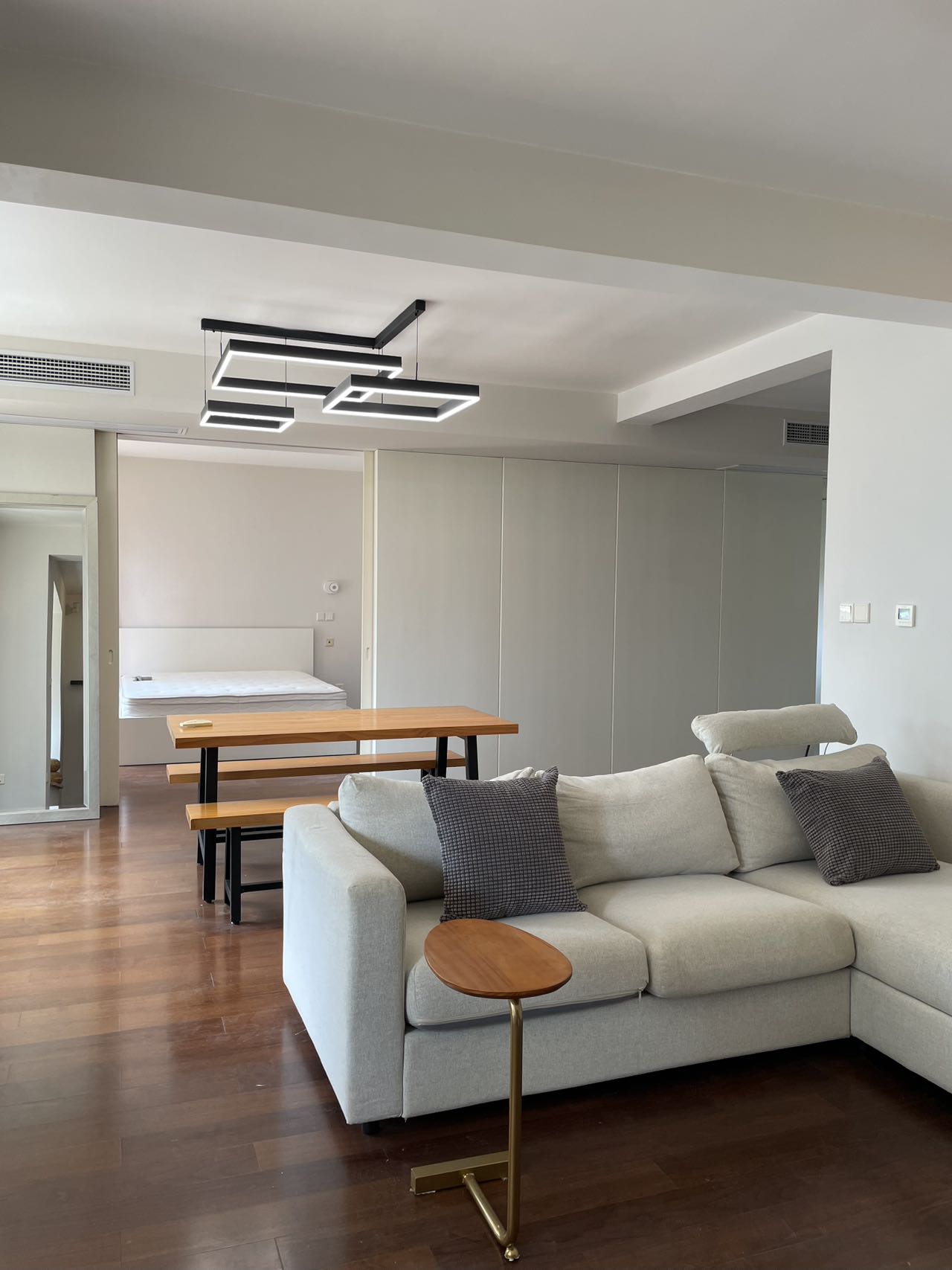 1+1 bedroom unit at Territory Shanghai with large terrace and open kitchen. 120 sqm, central Jing'an location, well-finished. Available July. 22,000 RMB/month.