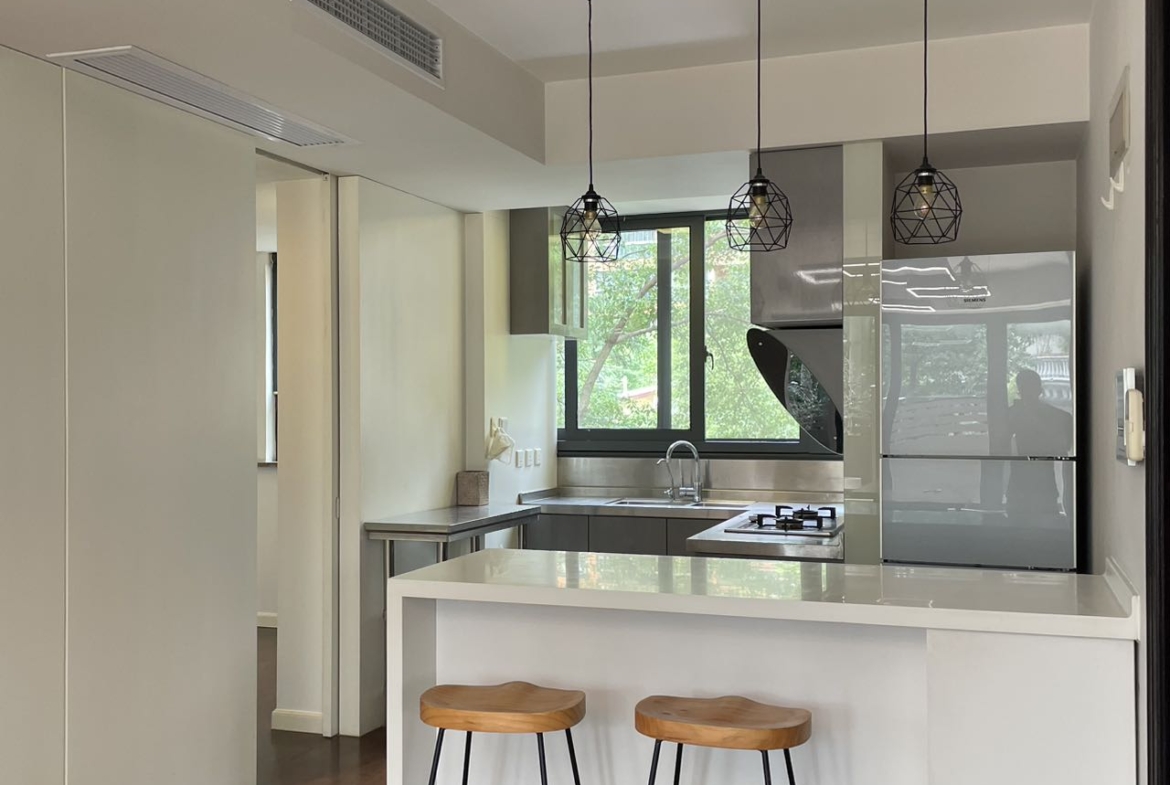 1+1 bedroom unit at Territory Shanghai with large terrace and open kitchen. 120 sqm, central Jing'an location, well-finished. Available July. 22,000 RMB/month.