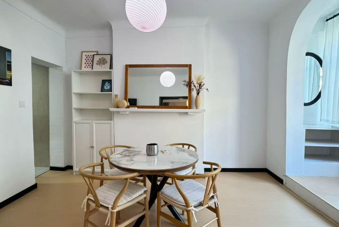 1-bed, 1-bath heritage unit on Wuyuan Road. South-facing bedroom and living room, bright, one unit per floor, owner direct. 9,800 RMB/month.