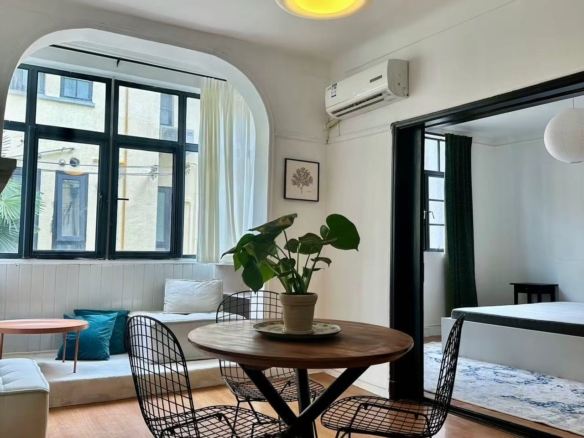 1-bed, 1-bath heritage unit on Wuyuan Road. South-facing bedroom and living room, bright, one unit per floor, owner direct. 9,800 RMB/month.