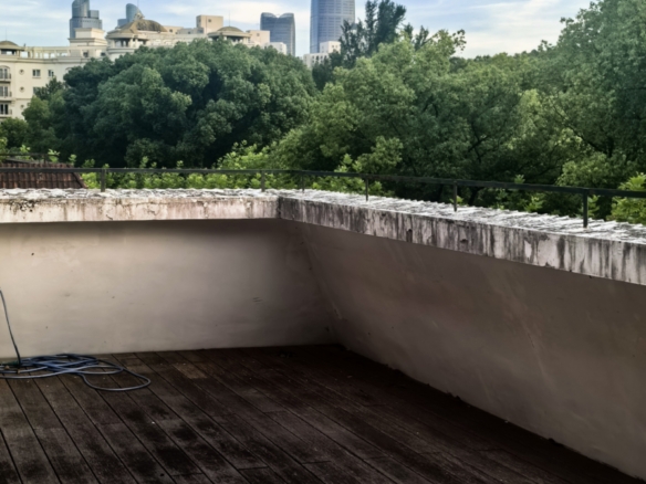 2-bed, 2-bath unit at 77 Xingguo Road with private 50 sqm terrace. 110 sqm, underfloor heating, prime FFC location near Hunan Road. 23,500 RMB/month.