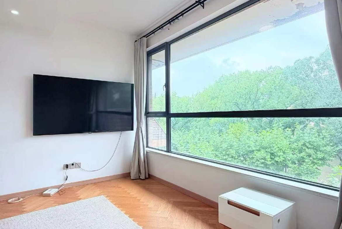 2-bed, 2-bath heritage unit on Xingguo Road with large terrace. 120 sqm, quiet FFC border location. 22,800 RMB/month.
