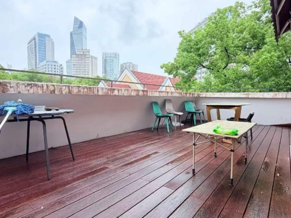 2-bed, 2-bath heritage unit on Xingguo Road with large terrace. 120 sqm, quiet FFC border location. 22,800 RMB/month.