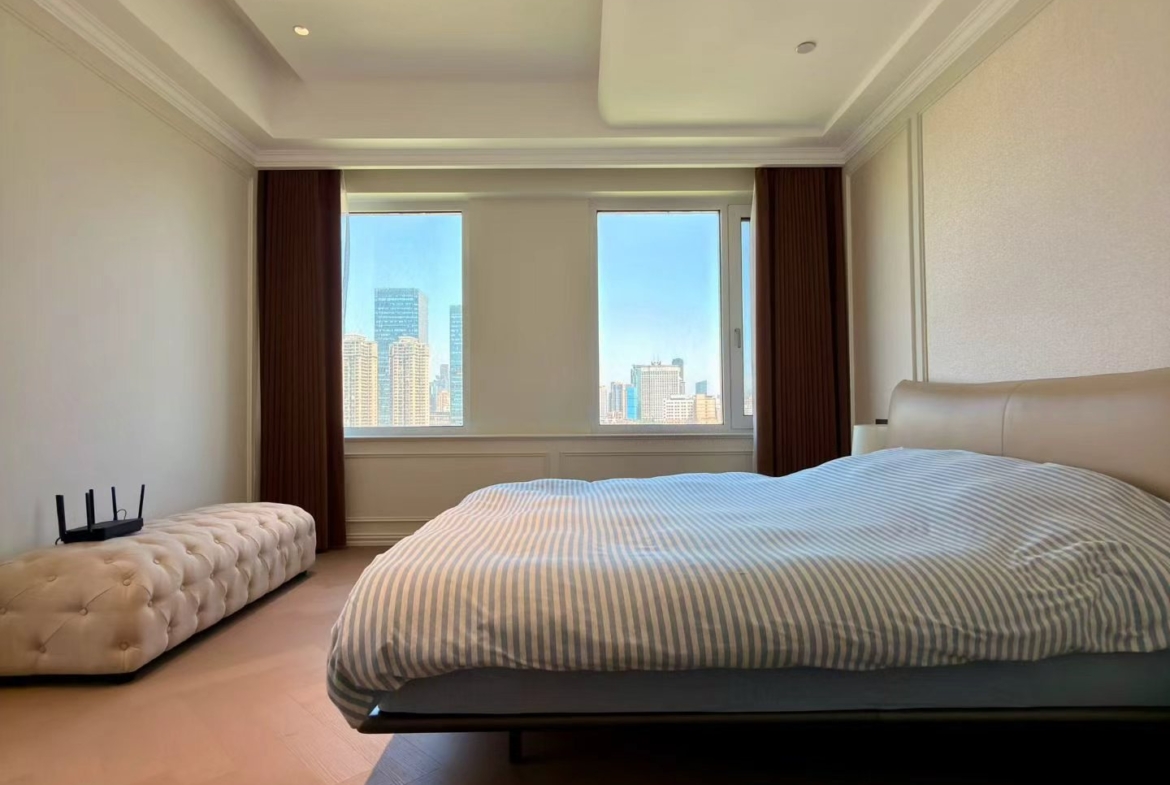 Large 4-bed, 3-bath flat near Shanghai Culture Square. 330 sqm, underfloor heating, central AC, fully furnished. 52,000 RMB/month.