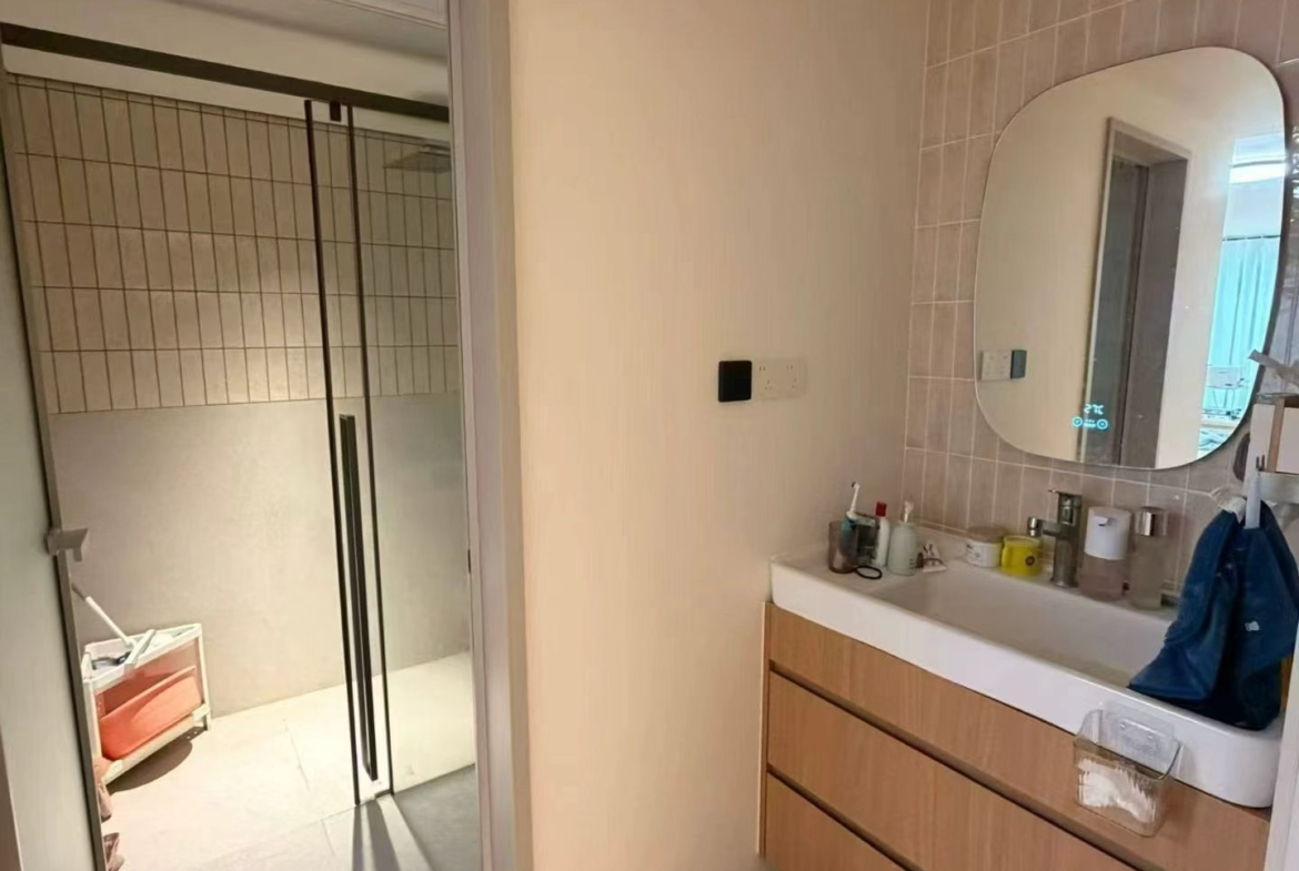 2-bed, 2-bath unit at Xuhui Yipinyuan on Anfu Road. Both bedrooms south-facing, panoramic living room windows, full underfloor heating. 28,000 RMB/month.