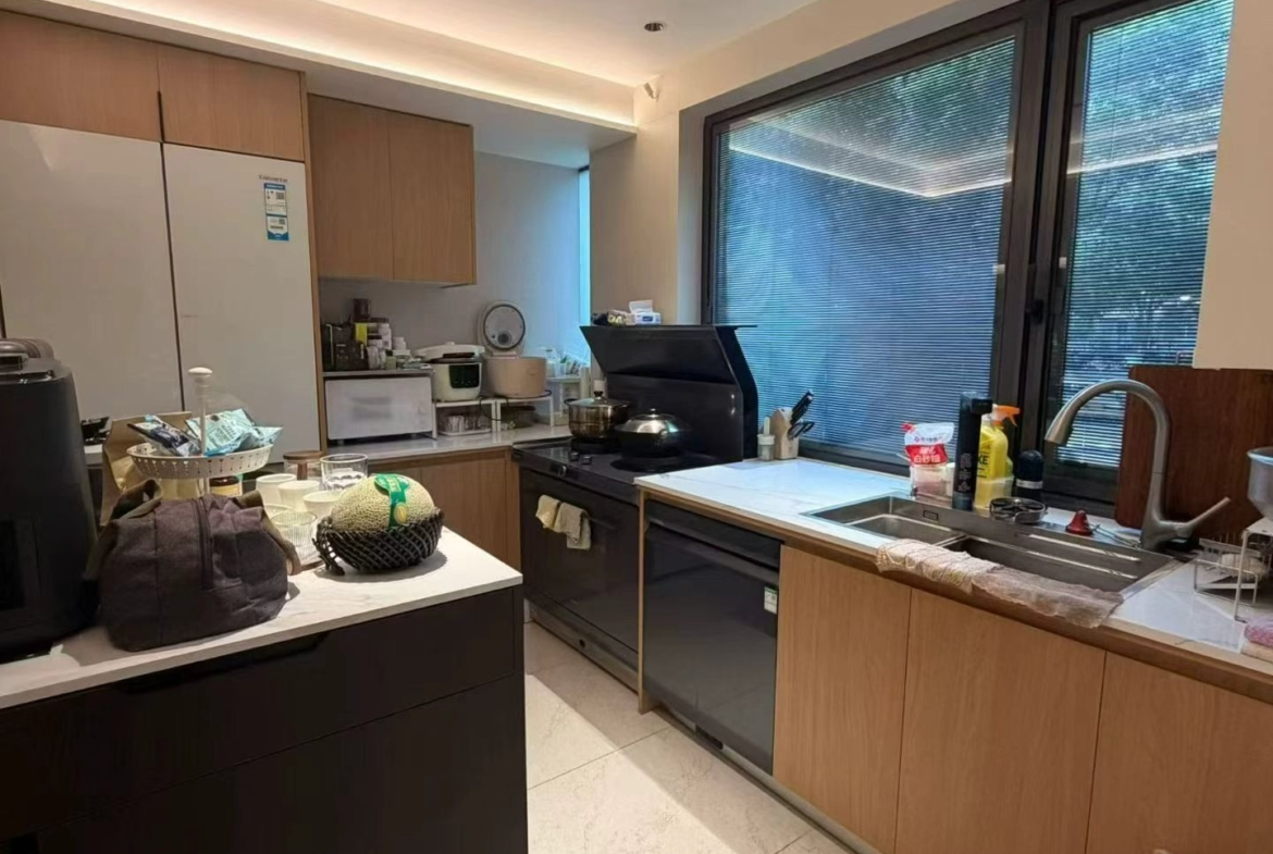 2-bed, 2-bath unit at Xuhui Yipinyuan on Anfu Road. Both bedrooms south-facing, panoramic living room windows, full underfloor heating. 28,000 RMB/month.