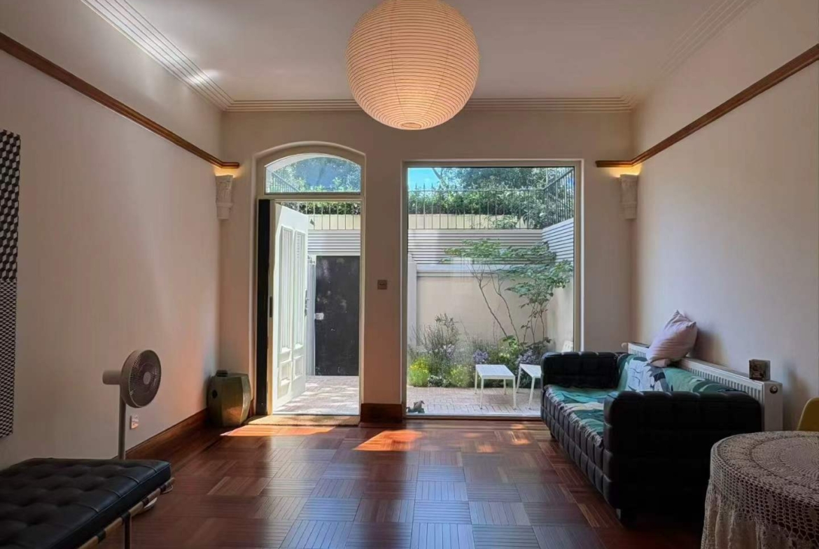 Entire lane house at Yuyuan Fang on Yuyuan Road. 5 beds, 3 baths, 300 sqm, garden, terrace, wall heating, fresh air system, heritage details. 60,000 RMB/month.