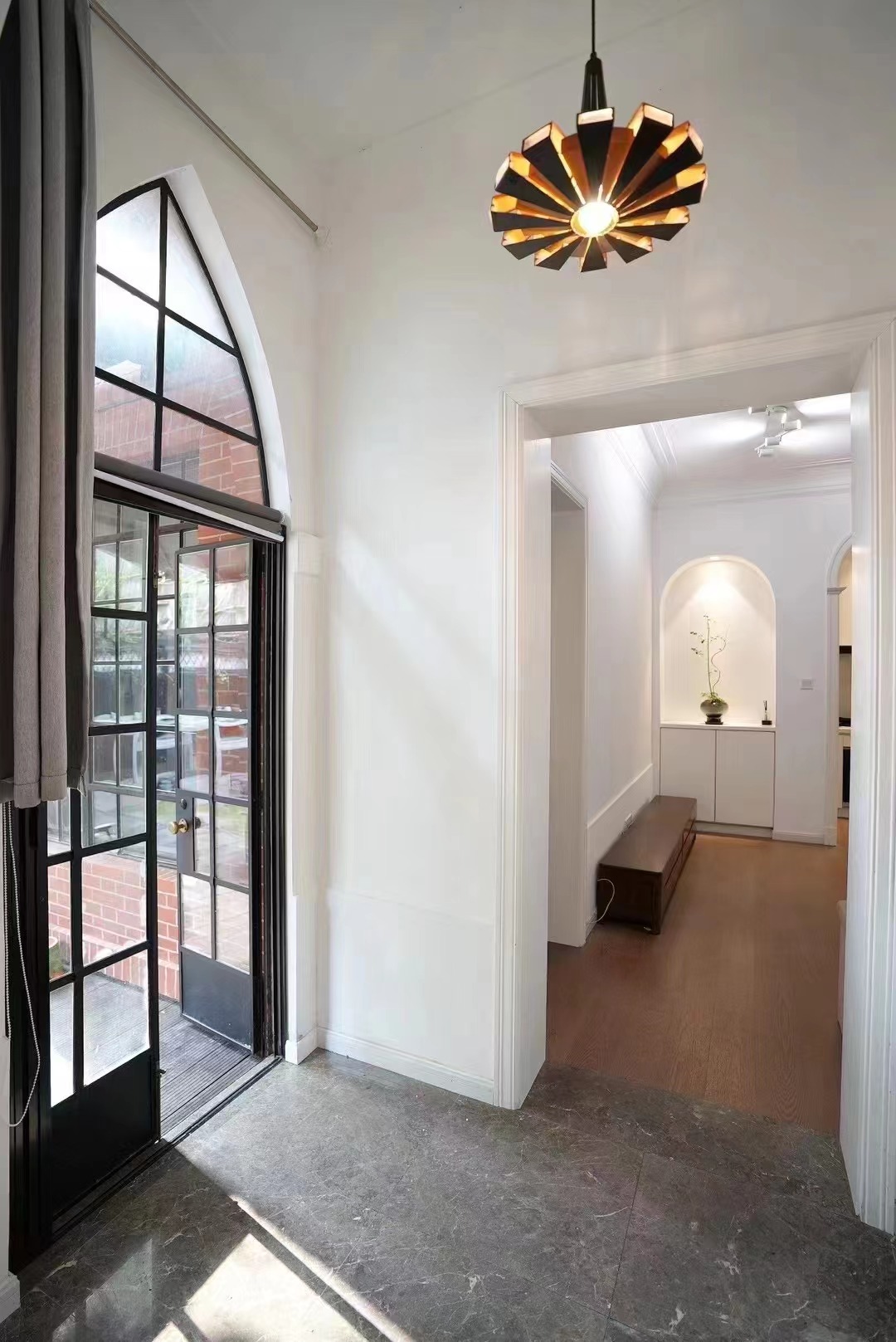 Ground floor unit at Lane 5, Gaoyou Road. 2 beds, 2 baths, 100 sqm interior, 100 sqm private garden, underfloor heating, walk-in closet, unfurnished. 30,000 RMB/month.