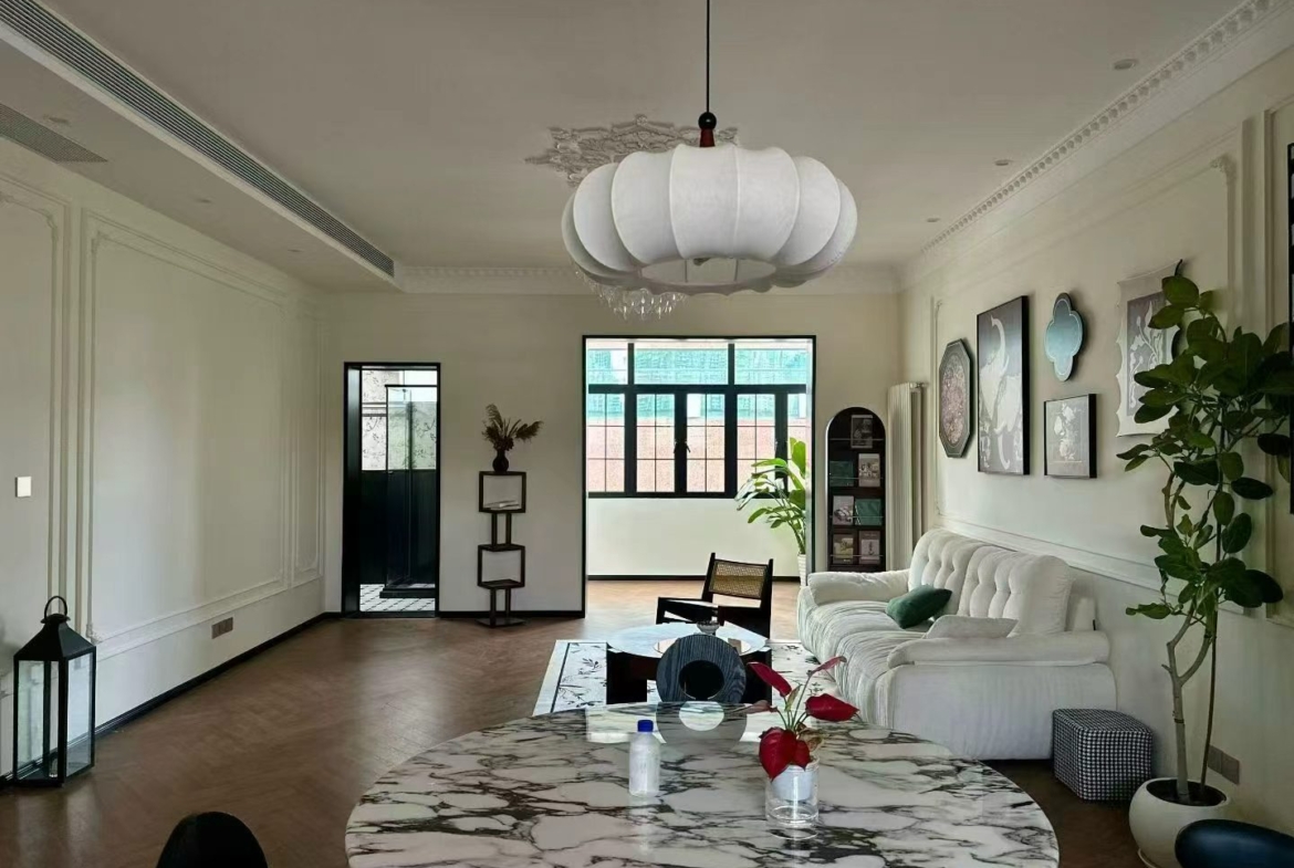 2-bed, 2-bath heritage unit on Huaihai Middle Road. 140 sqm, 4th floor, central FFC location. 29,800 RMB/month.