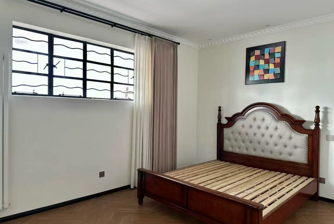 2-bed, 2-bath heritage unit on Huaihai Middle Road. 140 sqm, 4th floor, central FFC location. 29,800 RMB/month.