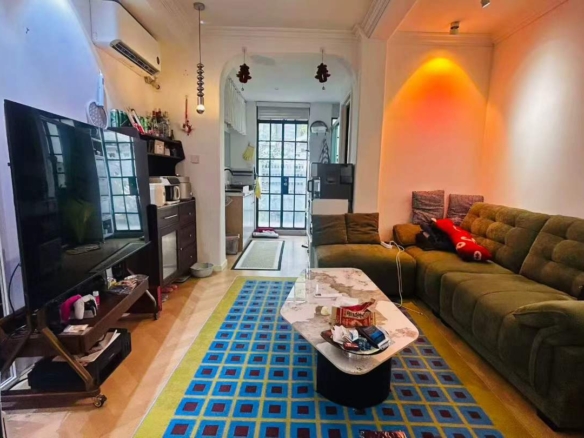 Ground floor lane house on Hunan Road with private garden. 1 bed, 1 bath, triple south-facing, 80 sqm. Live or work. 16,800 RMB/month.