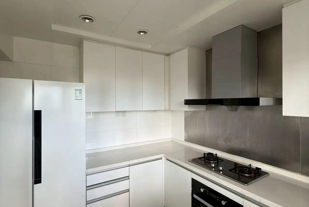 Penthouse unit at La Cite in Xujiahui. 155 sqm, 3 beds, 2 baths, storage room, 100 sqm private terrace. Steps from metro. 28,500 RMB/month.