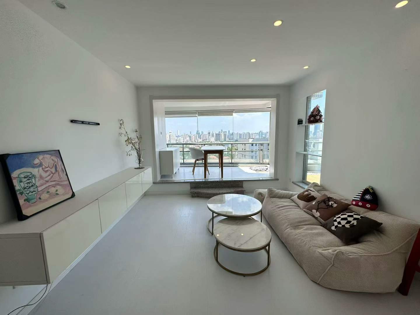 2-bed, 2-bath unit at Oriental Garden on Zhenning Road. 120 sqm, private terrace, central AC, parking included. 24,500 RMB/month.