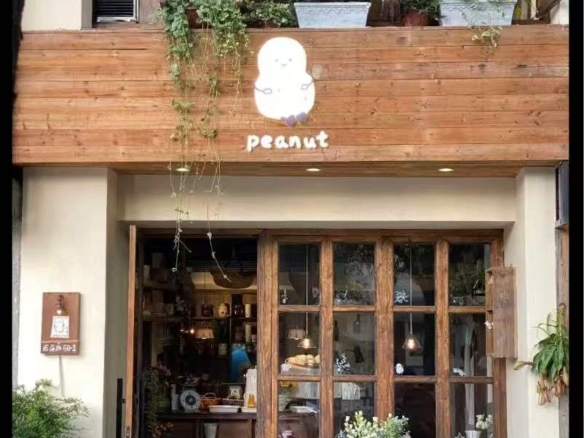 Street-front commercial space on Panyu Road. 200+ sqm, 10m frontage, 4m ceilings, large garden, fapiao included, business type flexible. 60,000 RMB/month.