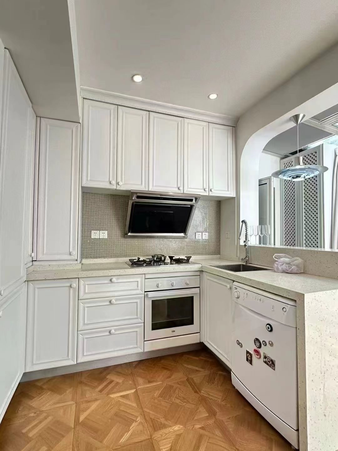 2-bed, 2-bath garden unit on Pingwu Road. 3.3m ceilings, north-south through, wall heating, garden views. 13,000 RMB/month.