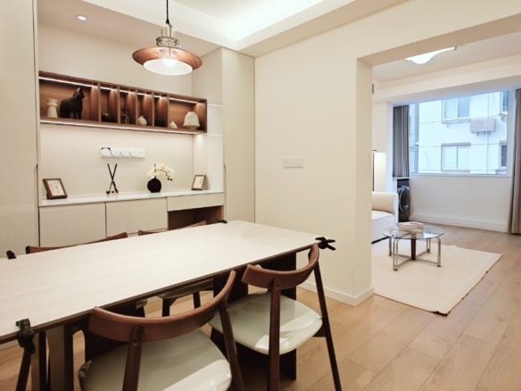 2-bed, 1-bath unit at Sihe Garden on Xinzha Road in Jing'an. 70 sqm, underfloor heating, separate living and dining rooms. Near Wuding Road Station. 14,500 RMB/month.