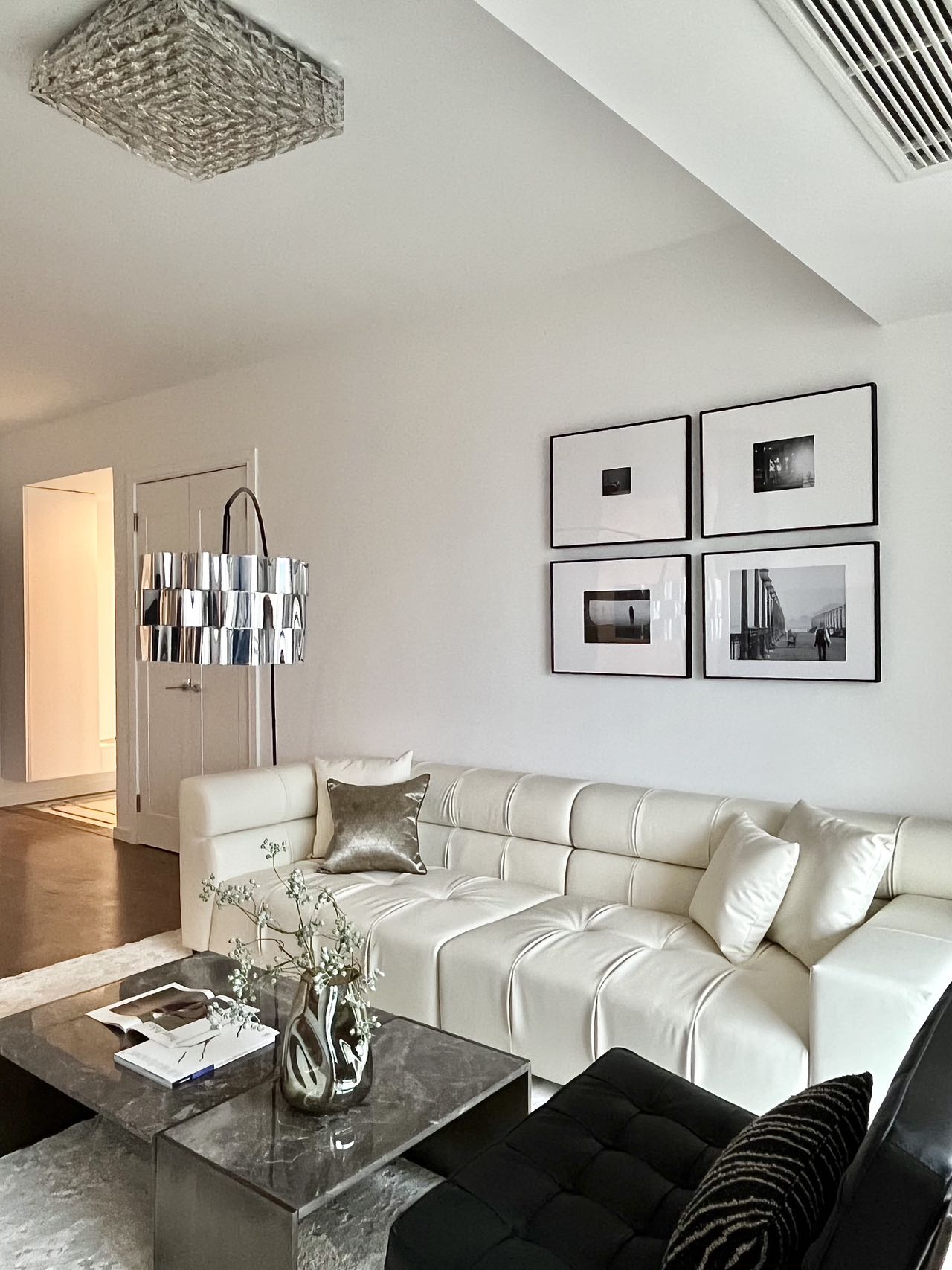 2-bed, 2-bath unit at Casa Lakeville in Xintiandi. High floor, central AC, underfloor heating, balcony, bathtub, Sony curved TV. 38,000 RMB/month.