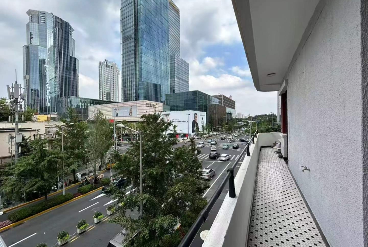 3-bed, 2-bath unit at Changde Apartments, a 1936 Art Deco heritage building in Jing'an. 167 sqm, balconies, owner renovation, steps from Jing'an Temple. 45,000 RMB/month.