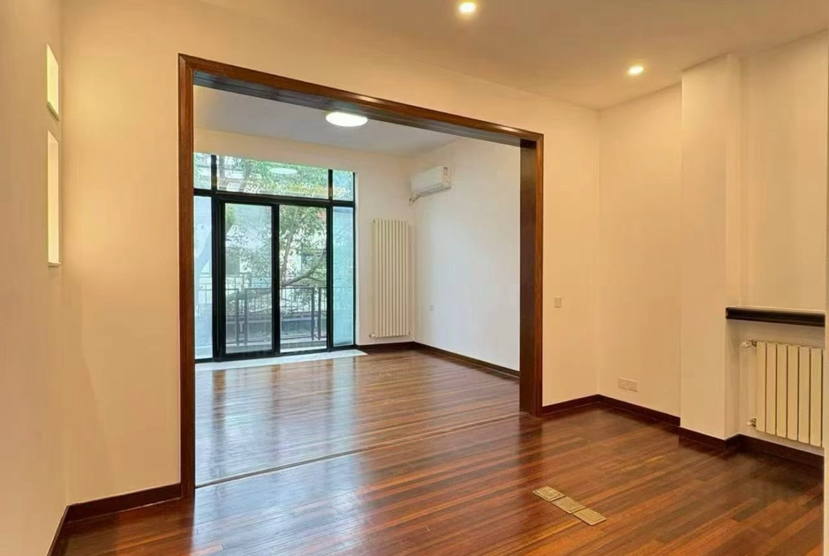 Whole 3-storey lane house for rent on Tianping Road, Xuhui. 200 sqm, 4 bedrooms, 3 bathrooms, 20 sqm garden and two terraces. Hengfu historic area. 38,000 RMB/month.