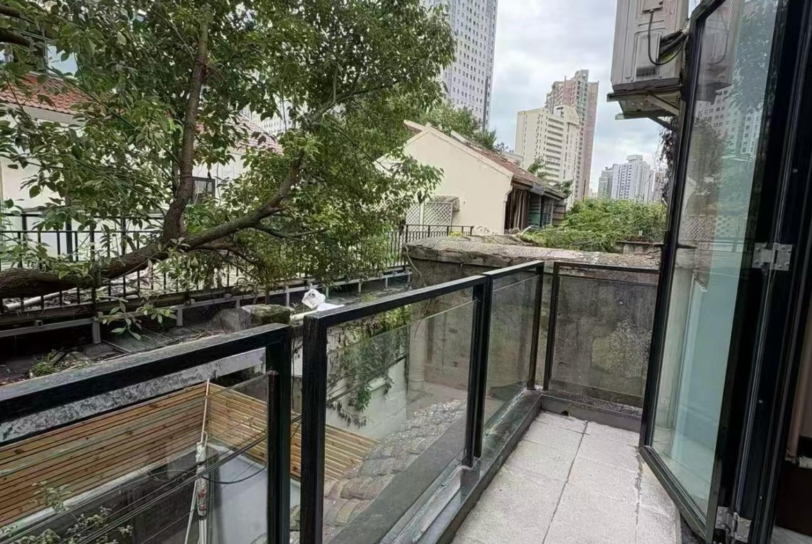 Whole 3-storey lane house for rent on Tianping Road, Xuhui. 200 sqm, 4 bedrooms, 3 bathrooms, 20 sqm garden and two terraces. Hengfu historic area. 38,000 RMB/month.