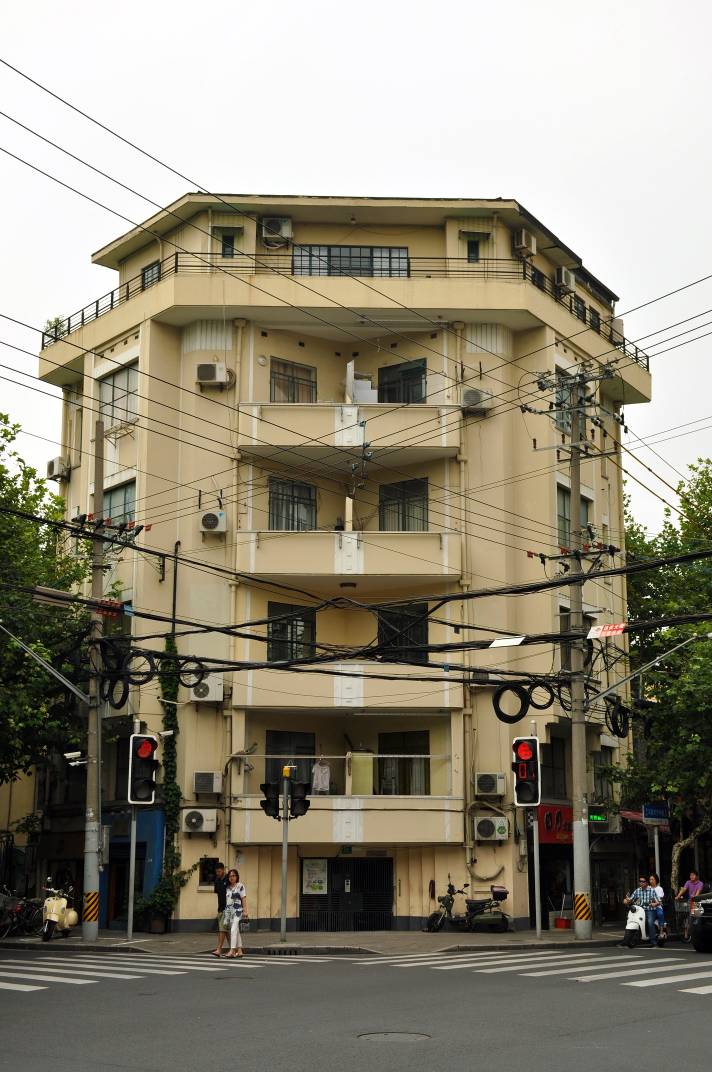 2-bed, 1-bath unit at Boissezon Apartment on West Fuxing Road. 145 sqm, outdoor balcony, heritage building (1931), near Shanghai Library Station. 28,600 RMB/month.