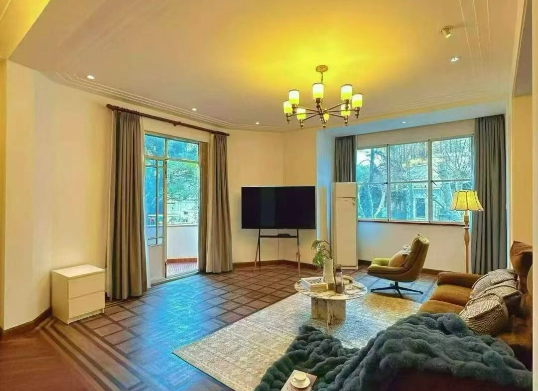 2-bed, 1-bath unit at Boissezon Apartment on West Fuxing Road. 145 sqm, outdoor balcony, heritage building (1931), near Shanghai Library Station. 28,600 RMB/month.