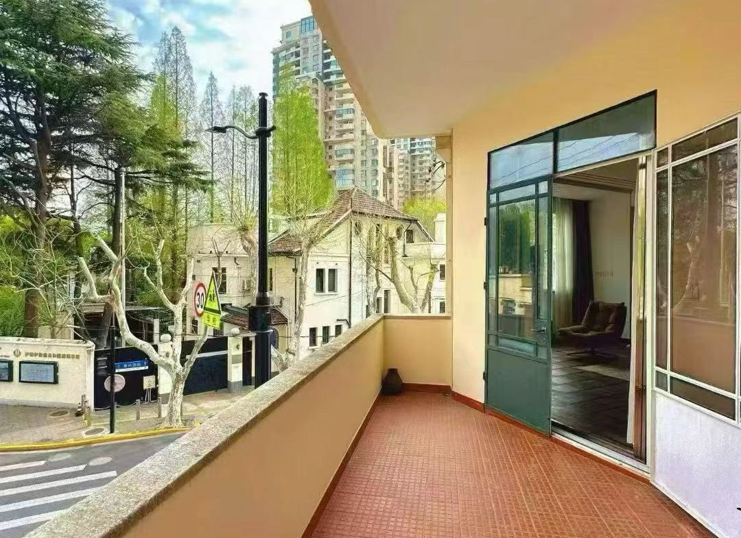 2-bed, 1-bath unit at Boissezon Apartment on West Fuxing Road. 145 sqm, outdoor balcony, heritage building (1931), near Shanghai Library Station. 28,600 RMB/month.