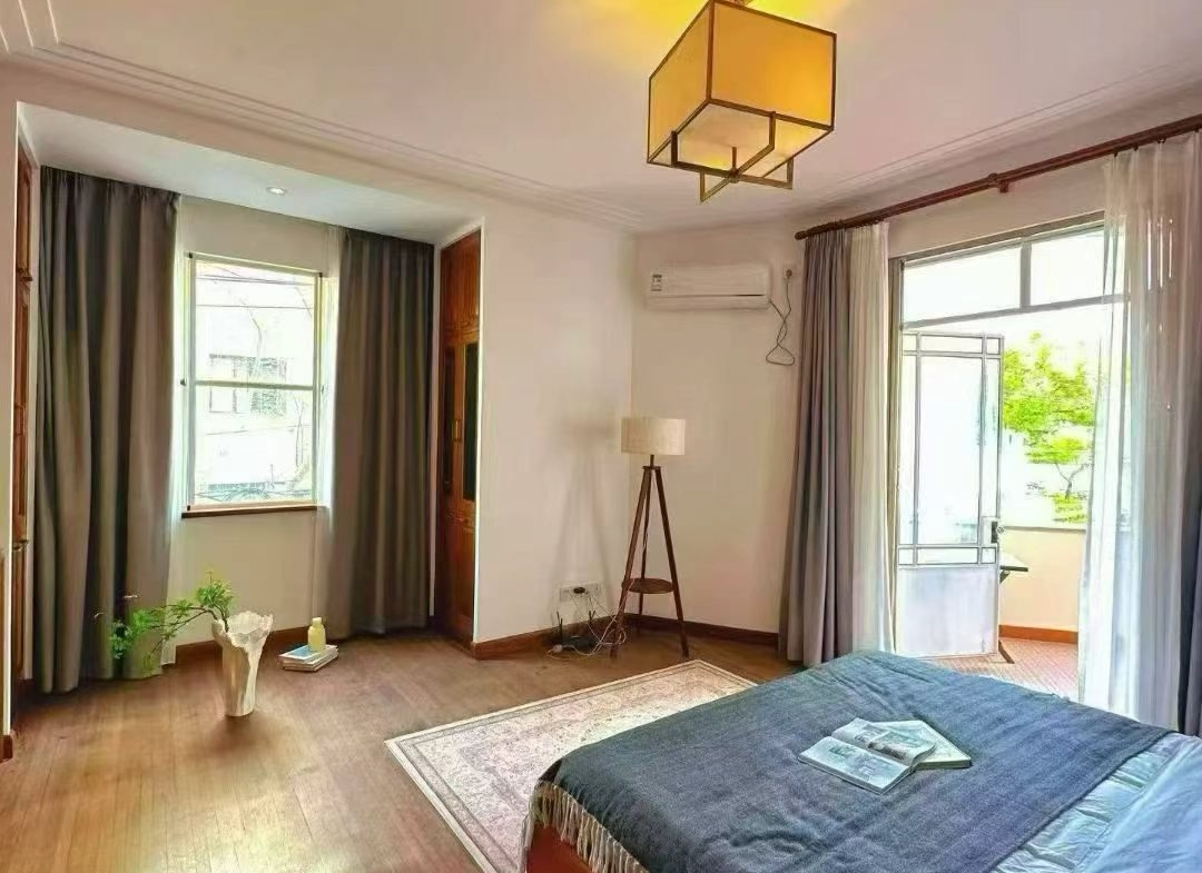 2-bed, 1-bath unit at Boissezon Apartment on West Fuxing Road. 145 sqm, outdoor balcony, heritage building (1931), near Shanghai Library Station. 28,600 RMB/month.