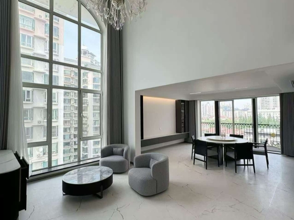 Rare 318 sqm top-floor duplex at Garland Service Apartment (新华嘉利阳光豪庭) in Changning. 4+1 beds, double-height living room, terrace, central AC, floor heating, fresh air. 65,000 RMB/month.