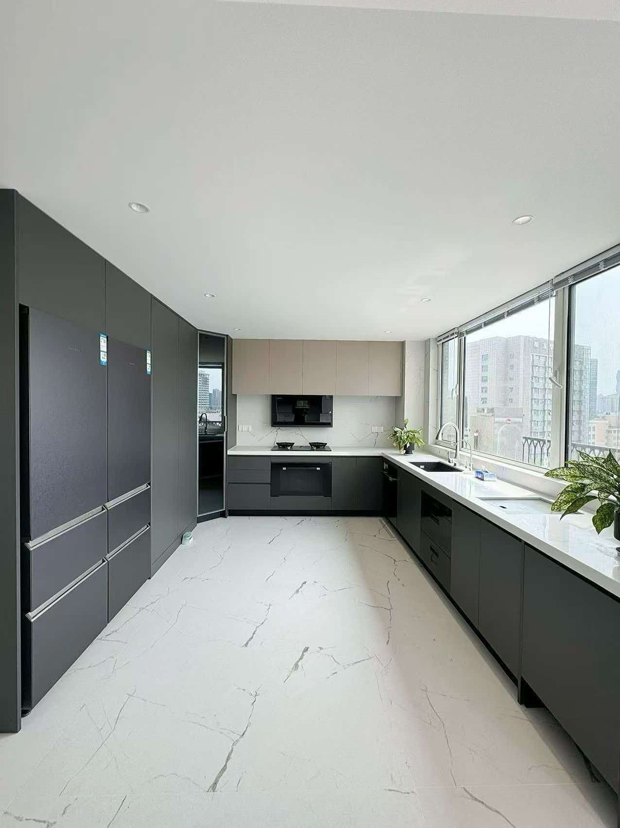Rare 318 sqm top-floor duplex at Garland Service Apartment (新华嘉利阳光豪庭) in Changning. 4+1 beds, double-height living room, terrace, central AC, floor heating, fresh air. 65,000 RMB/month.
