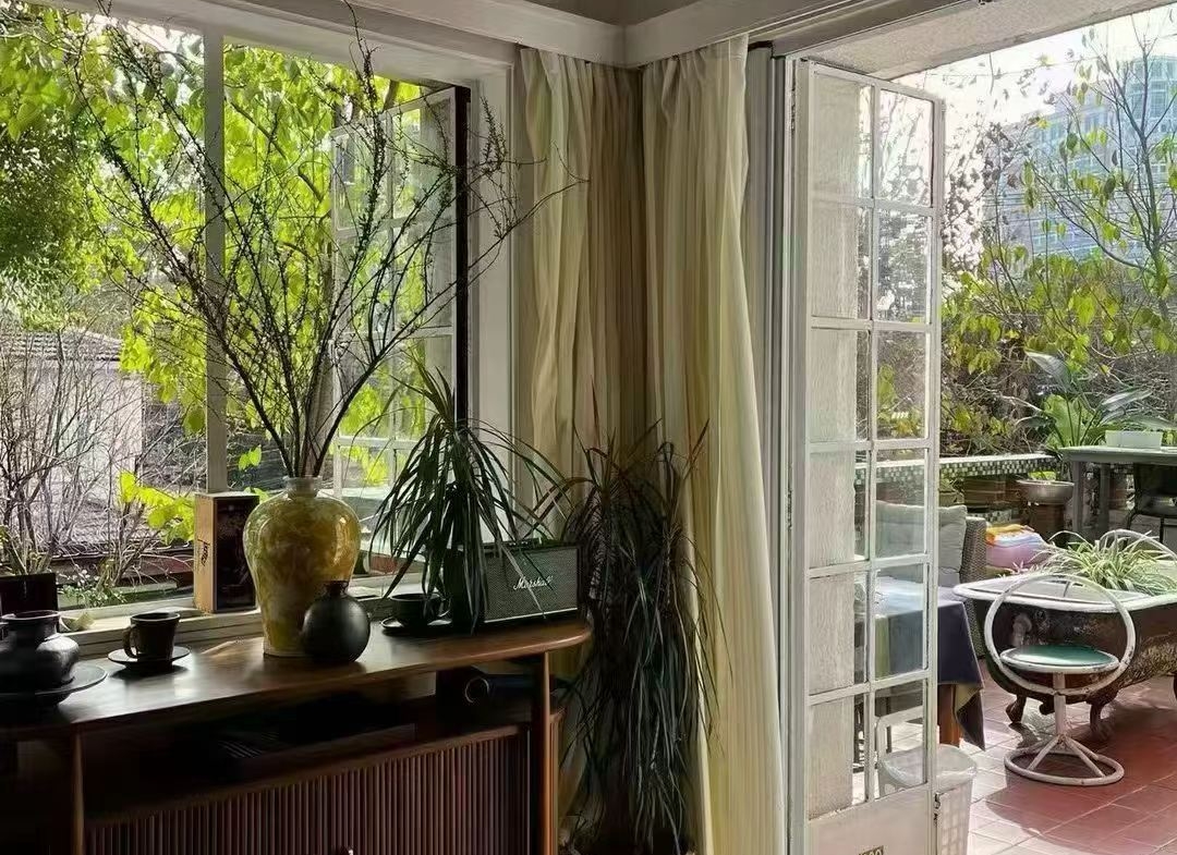 Large 1-bedroom in an English country garden house at Huashan Road and West Fuxing Road. 30 sqm private terrace, three-sided light. Central FFC location. 13,000 RMB/month.