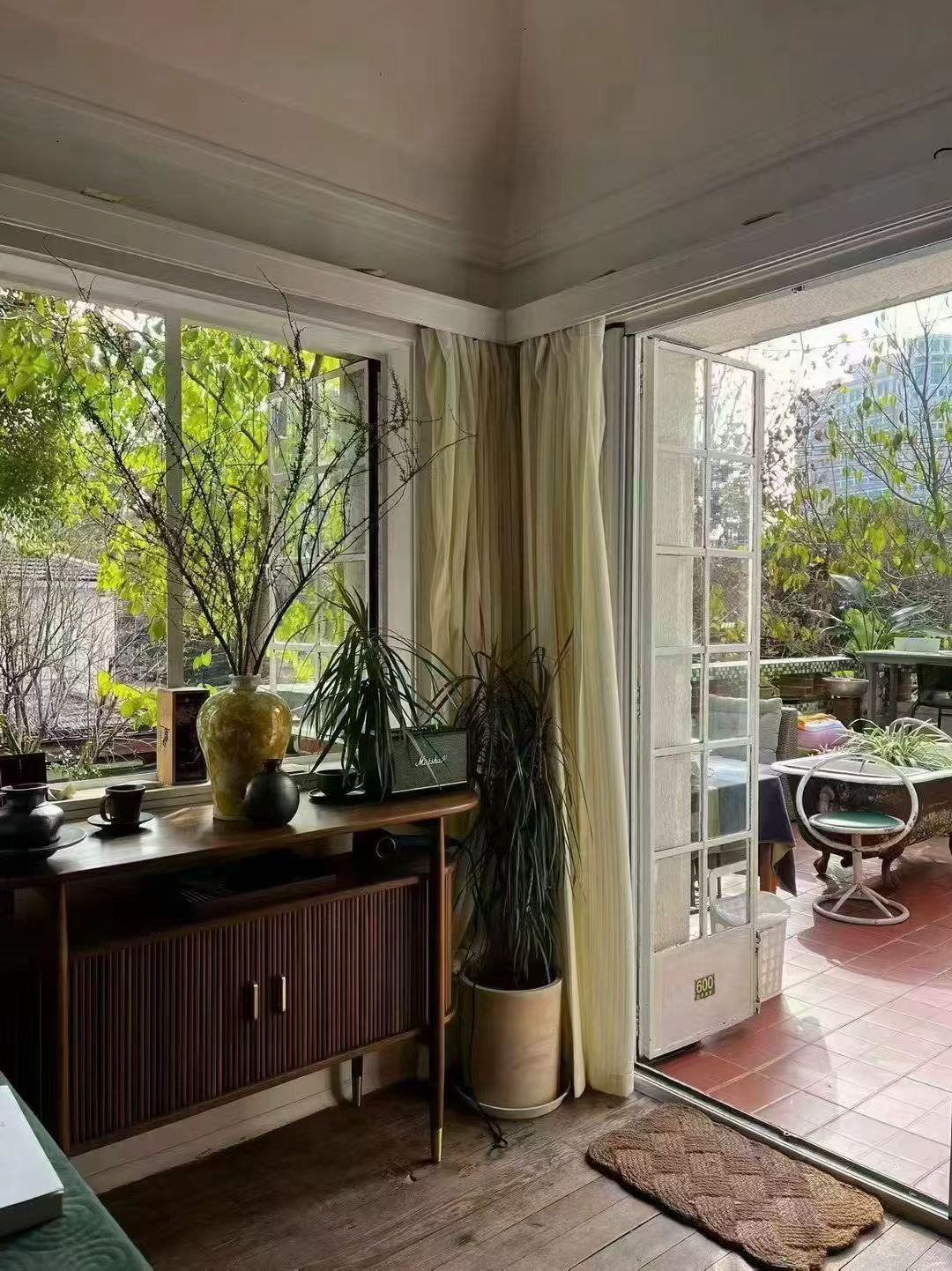 Large 1-bedroom in an English country garden house at Huashan Road and West Fuxing Road. 30 sqm private terrace, three-sided light. Central FFC location. 13,000 RMB/month.