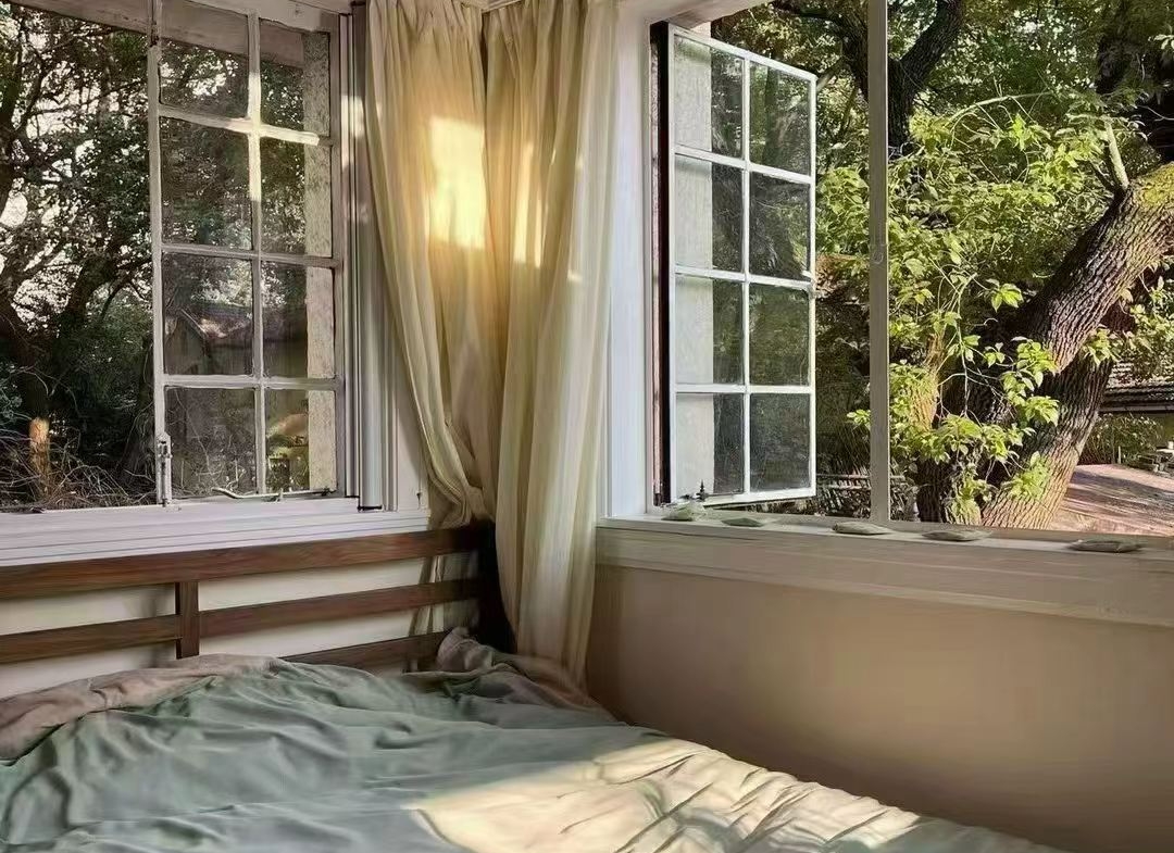 Large 1-bedroom in an English country garden house at Huashan Road and West Fuxing Road. 30 sqm private terrace, three-sided light. Central FFC location. 13,000 RMB/month.