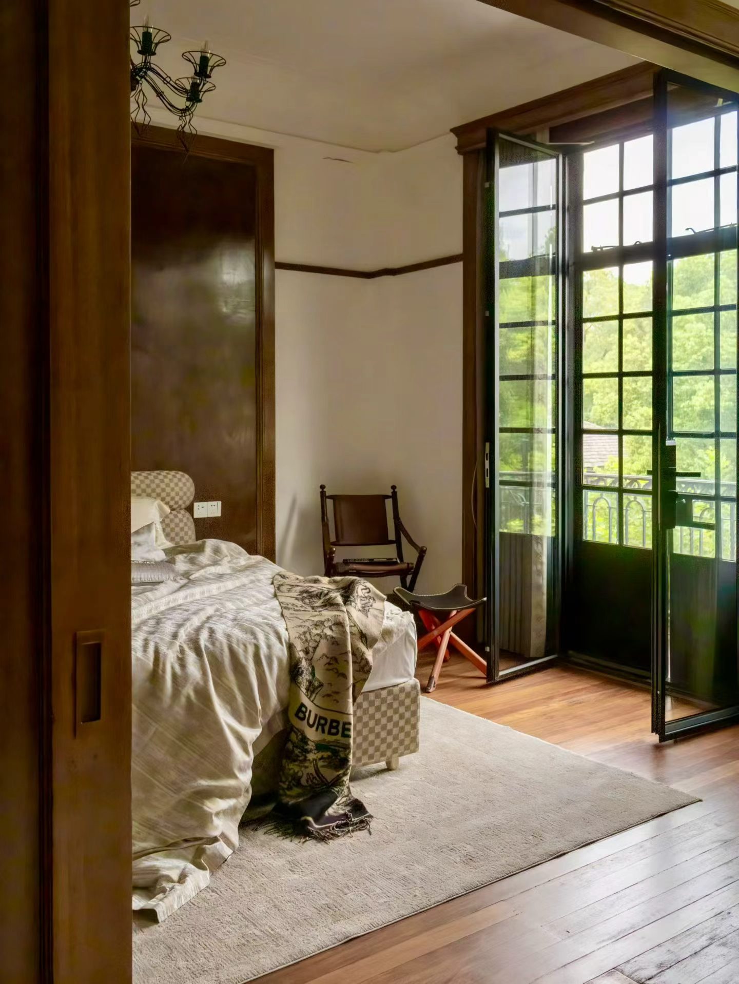 Rare south-facing 1-bed at the Wukang Building. 90 sqm, balcony facing the Soong Ching-ling residence, original fireplace and teak floors, central AC. 28,000 RMB/month.