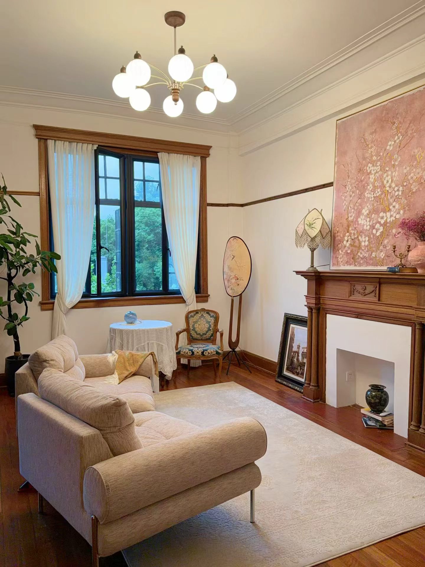 Rare south-facing 1-bed at the Wukang Building. 90 sqm, balcony facing the Soong Ching-ling residence, original fireplace and teak floors, central AC. 28,000 RMB/month.