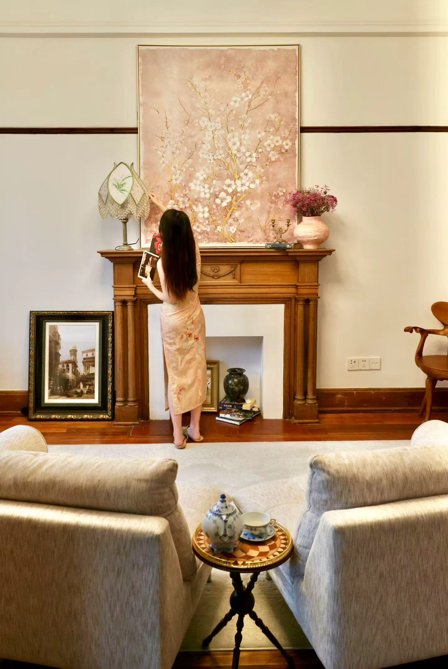 Rare south-facing 1-bed at the Wukang Building. 90 sqm, balcony facing the Soong Ching-ling residence, original fireplace and teak floors, central AC. 28,000 RMB/month.