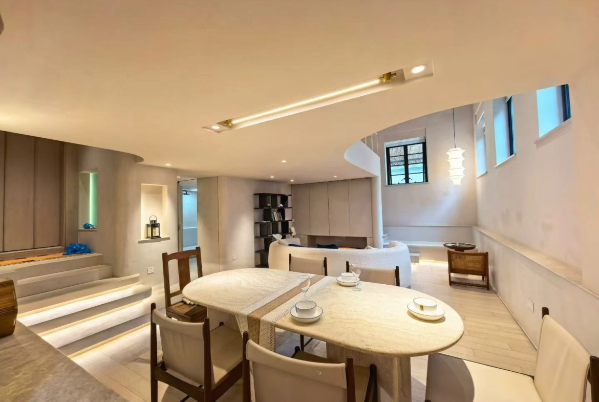 2-bed, 2-bath heritage lane house apartment at Lane 63, Xingguo Road. 150 sqm, central AC, floor heating, near Jiaotong University Station. 20,000 RMB/month.