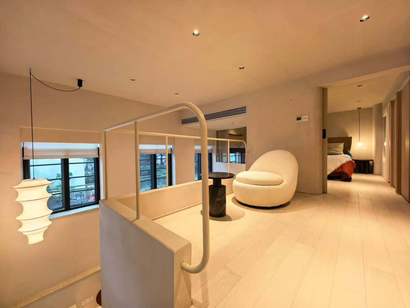 2-bed, 2-bath heritage lane house apartment at Lane 63, Xingguo Road. 150 sqm, central AC, floor heating, near Jiaotong University Station. 20,000 RMB/month.